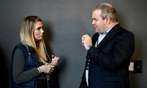 Liam Harbison chats to attendee